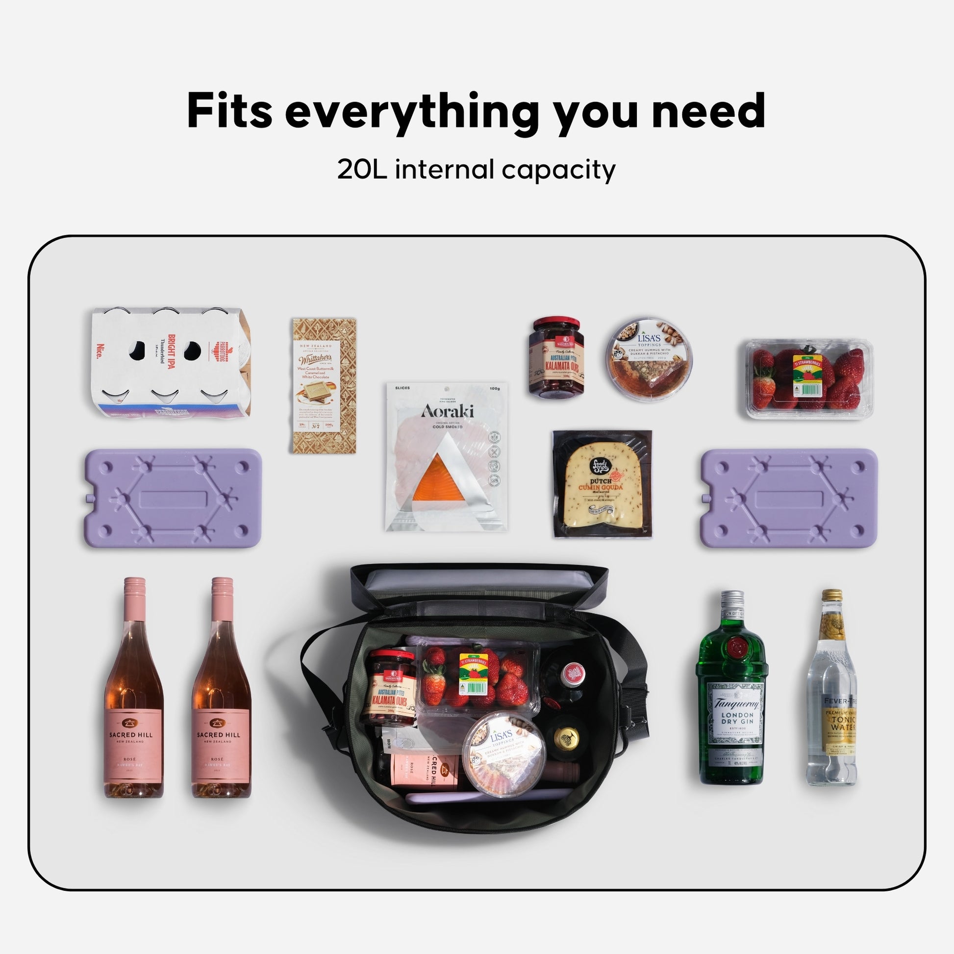 NIPPY Cooler bag with picnic and drink ingredients layed out on white background to show how much fits in the cooler